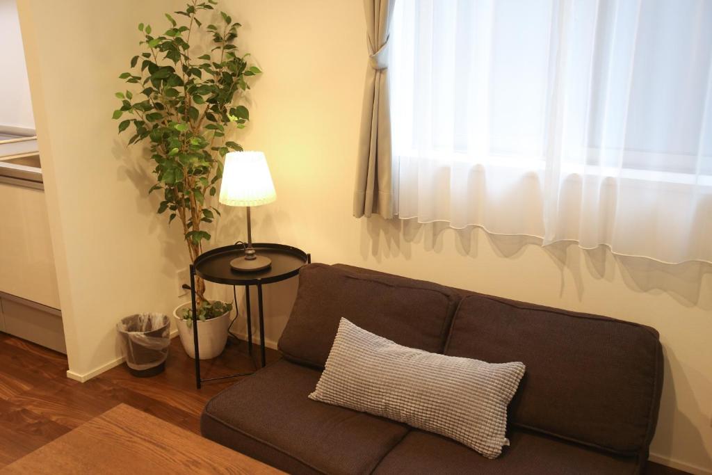 Posezení v ubytování Apartment Hotel Tenjin TUMUGU