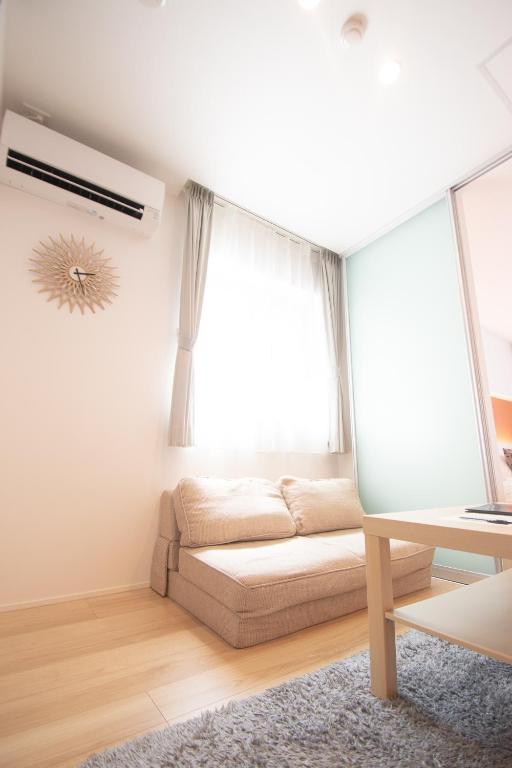 Posezení v ubytování Apartment Hotel Tenjin TUMUGU