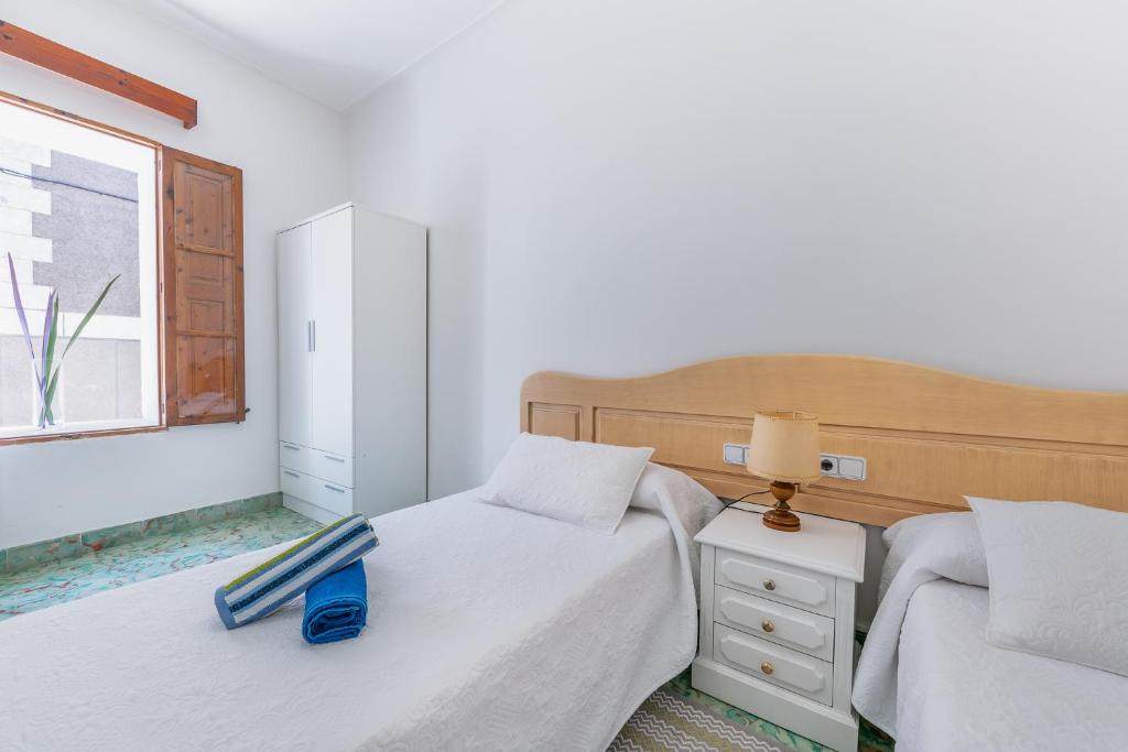 Postel nebo postele na pokoji v ubytování Holiday Home S'Arraval