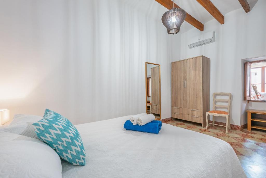 Postel nebo postele na pokoji v ubytování Holiday Home S'Arraval