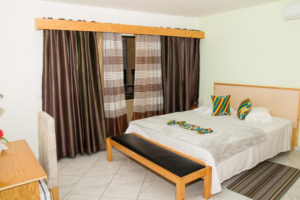 Postel nebo postele na pokoji v ubytování LT Aparthotel