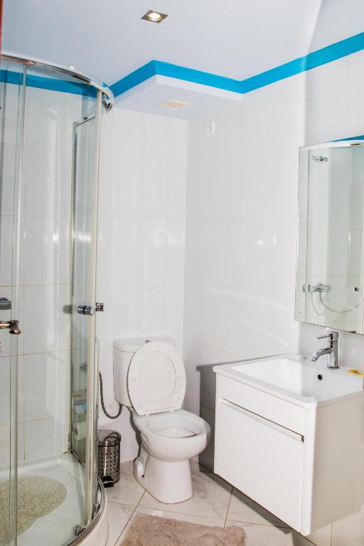 Koupelna v ubytování LT Aparthotel