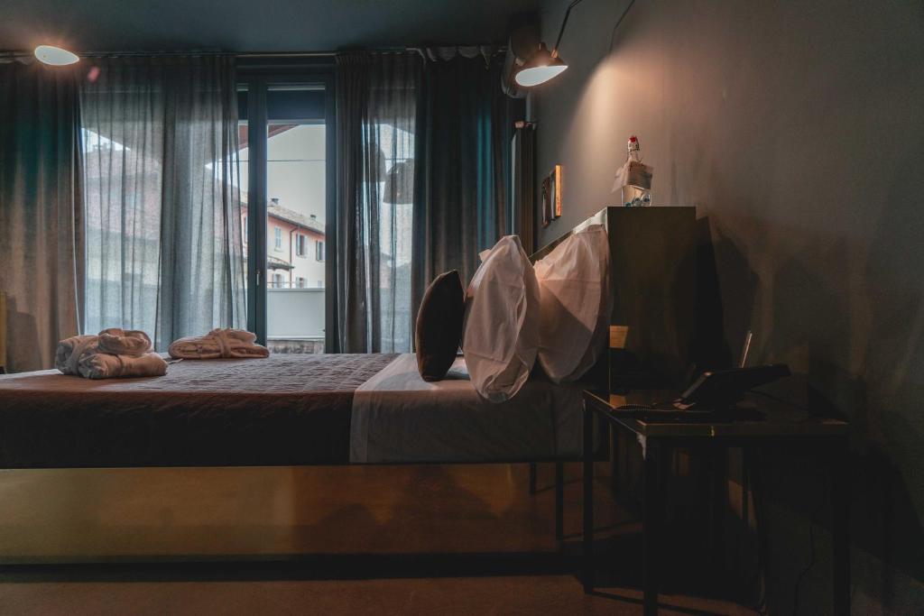 Postel nebo postele na pokoji v ubytování Boutique Hotel Borgo Nuovo
