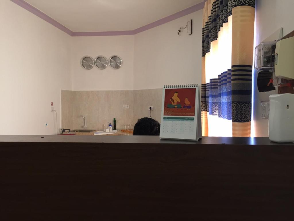 Kuchyň nebo kuchyňský kout v ubytování Moodhumaa Inn