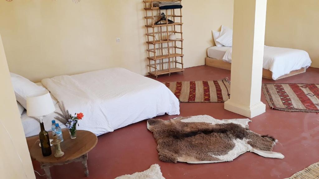 Postel nebo postele na pokoji v ubytování la fromagerie essaouira