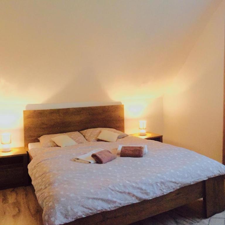 Postel nebo postele na pokoji v ubytování RELAX PENZIÓN J&L