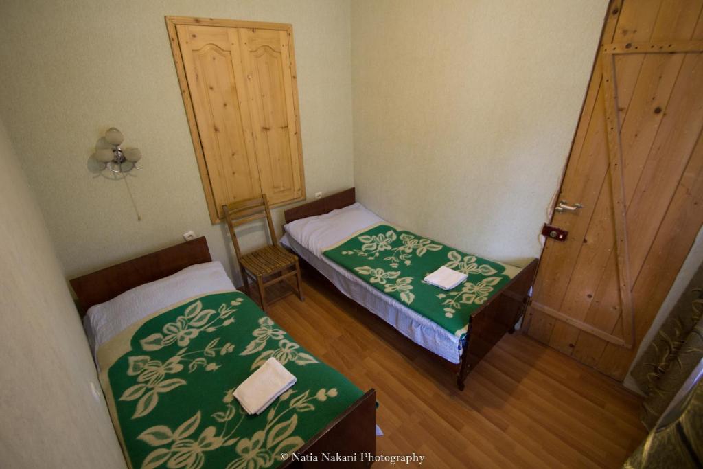 Postel nebo postele na pokoji v ubytování Eka&Nino GuestHouse