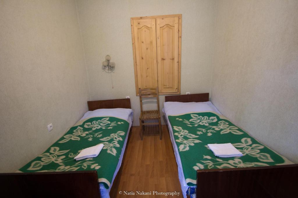 Postel nebo postele na pokoji v ubytování Eka&Nino GuestHouse