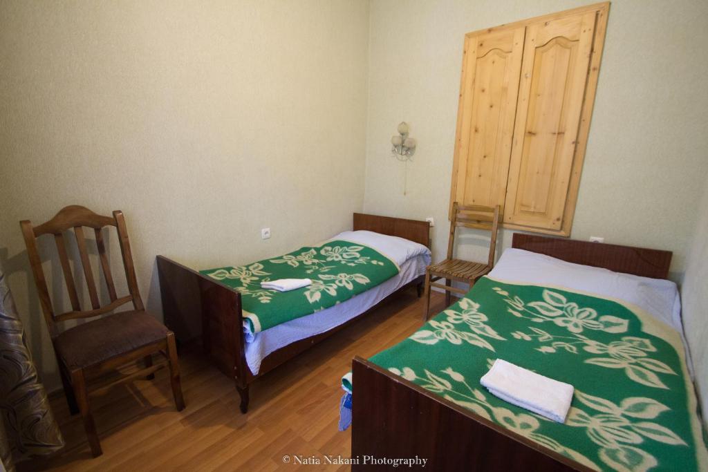 Postel nebo postele na pokoji v ubytování Eka&Nino GuestHouse