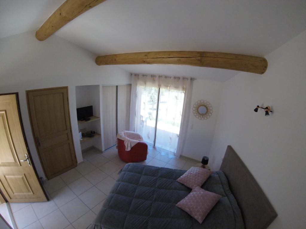 Postel nebo postele na pokoji v ubytování LA MAGUETTE