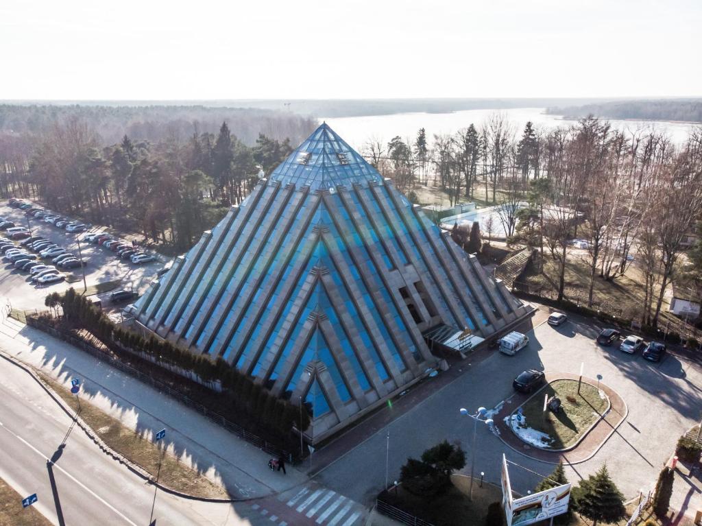 an overhead view of a building with a pyramid at Piramida Park Hotel & Wellness in Tychy