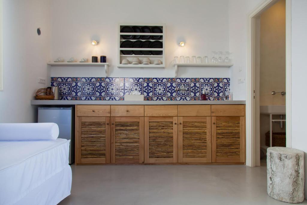 Кухня или мини-кухня в Astarte Luxury Apartments
