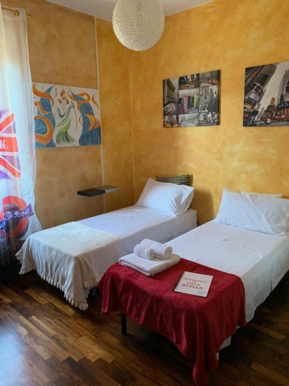 Łóżko lub łóżka w pokoju w obiekcie Villa Stella