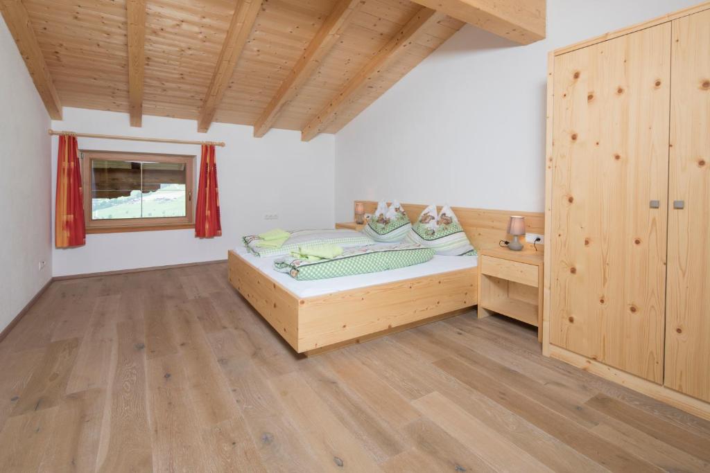 Posteľ alebo postele v izbe v ubytovaní Bauernhaus Roßmoos
