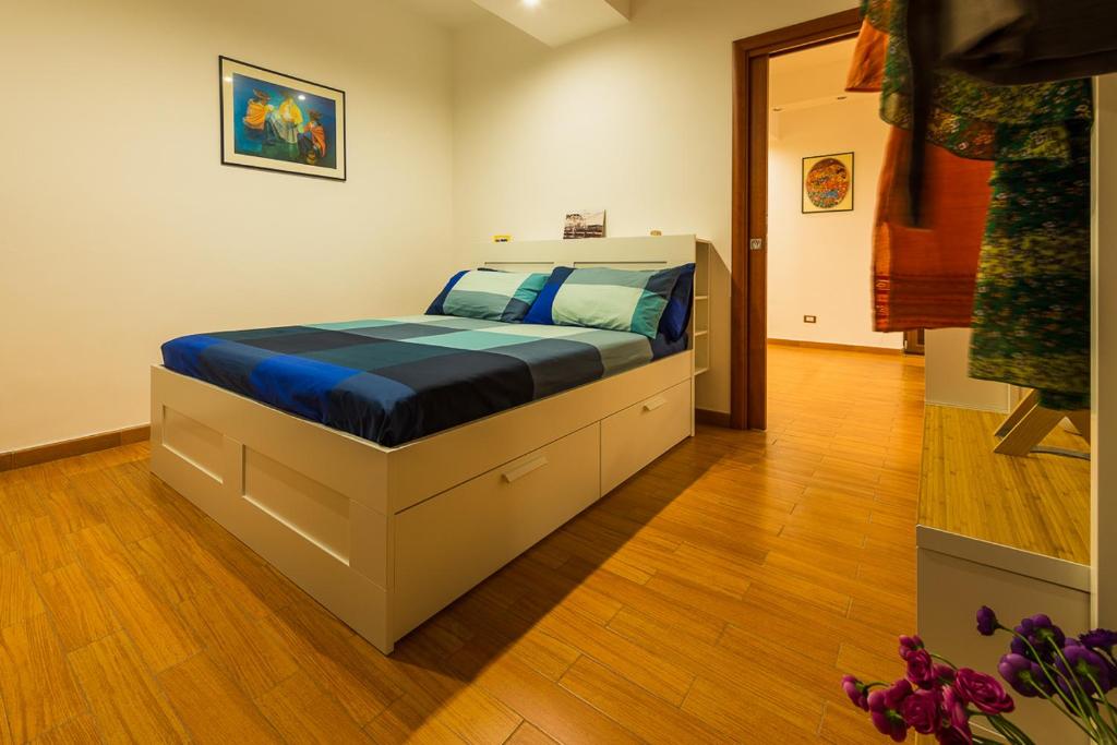 A bed or beds in a room at L'Approdo B&B