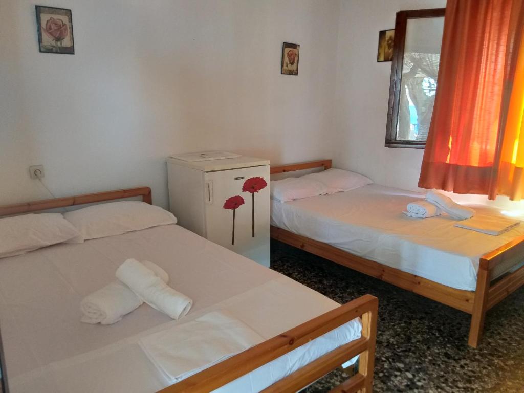 Postel nebo postele na pokoji v ubytování Sea View Bungalows