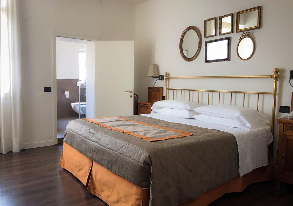 Posteľ alebo postele v izbe v ubytovaní Terme Preistoriche Resort & Spa