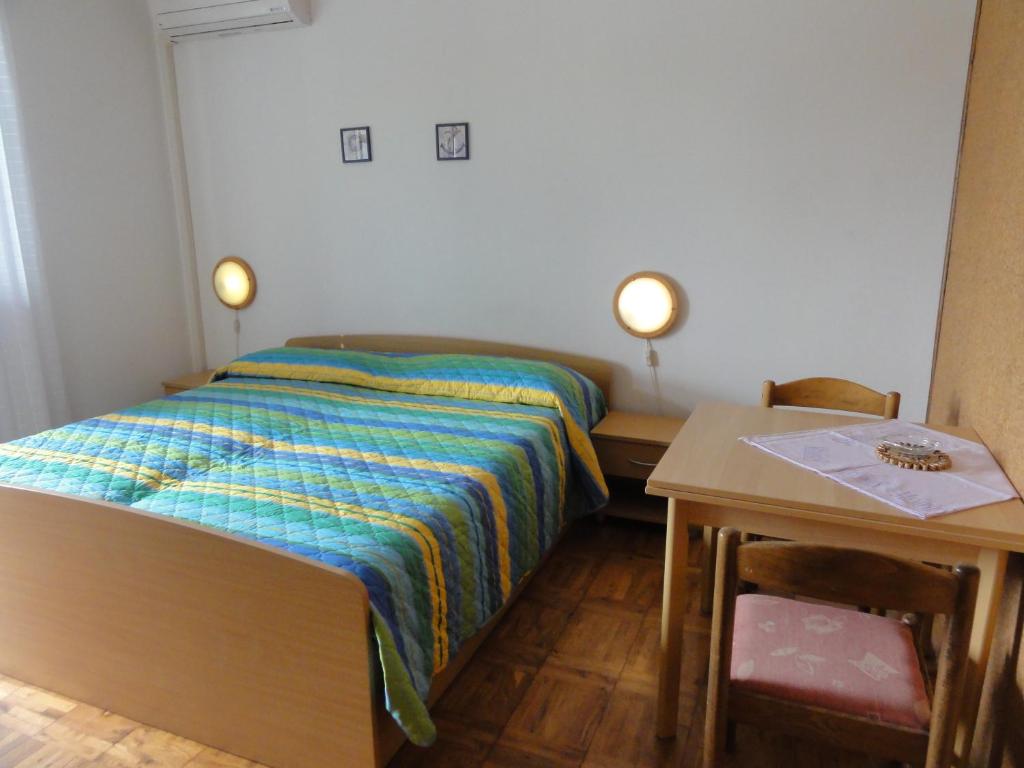 Postel nebo postele na pokoji v ubytování Nice and cozy Apartment Ferry in Medulin