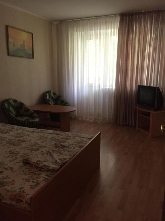 Postel nebo postele na pokoji v ubytování 2-х комнатная квартира, первая линия от моря