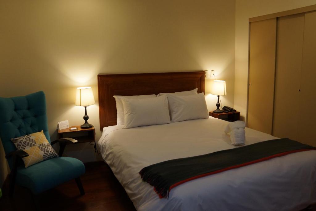 Ένα ή περισσότερα κρεβάτια σε δωμάτιο στο Atrium Miraflores Hotel