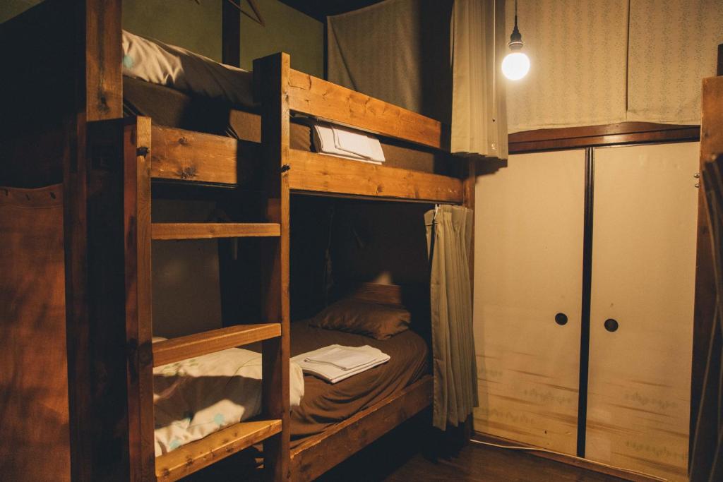 Postel nebo postele na pokoji v ubytování Guesthouse toco