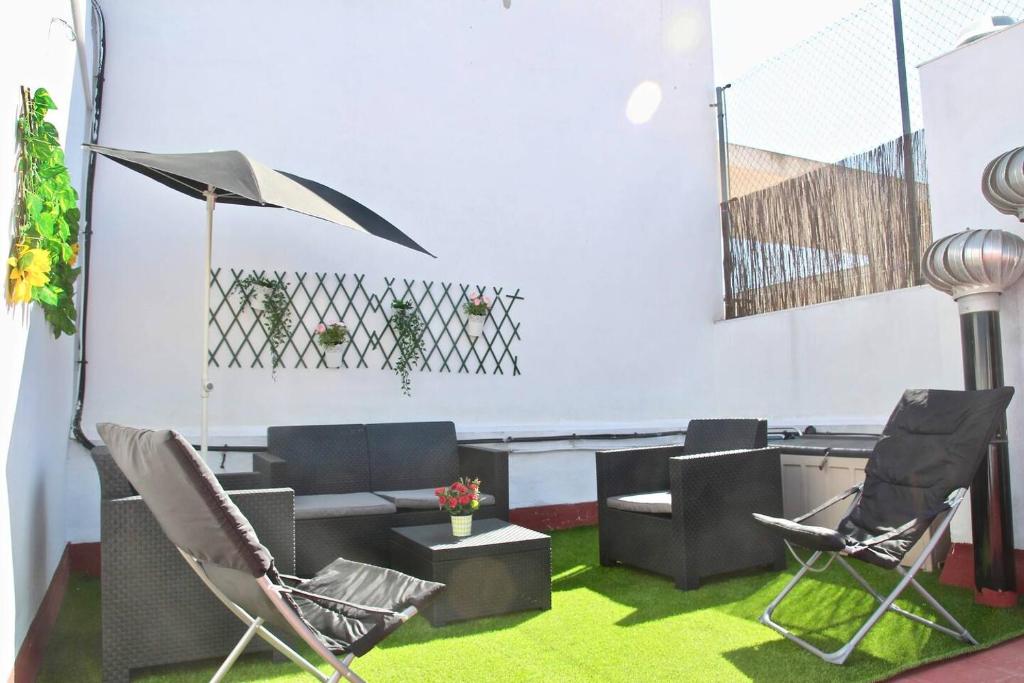 Posedenie v ubytovaní Dúplex TERRAZA DEL FALLA