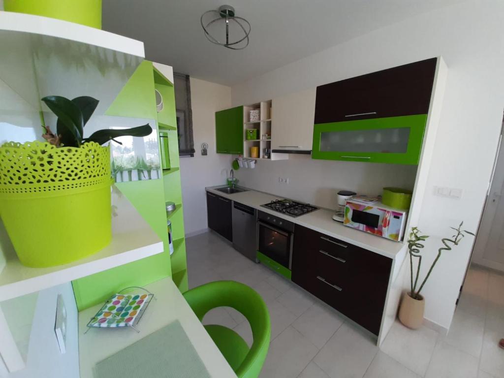 Kuchyň nebo kuchyňský kout v ubytování Apartment Mia