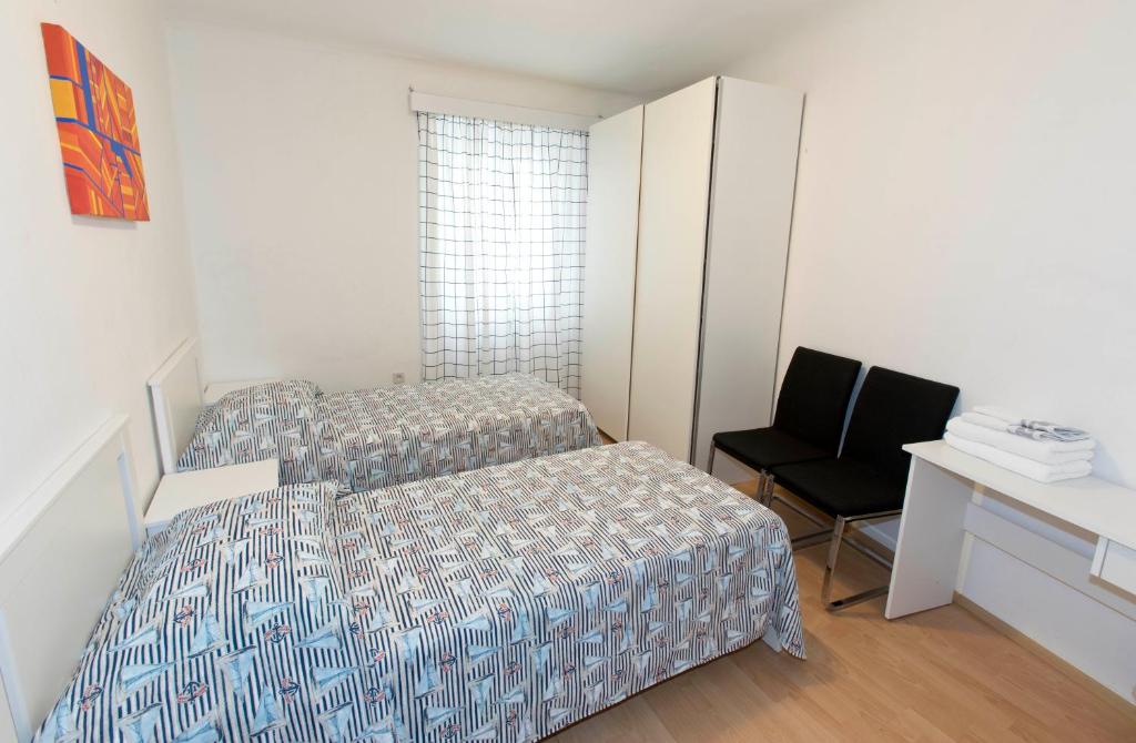 Postel nebo postele na pokoji v ubytování Sobe pri Anici