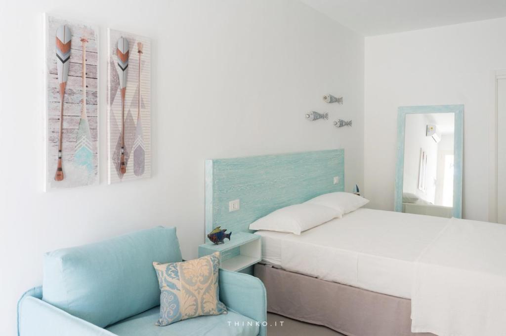 Postel nebo postele na pokoji v ubytování Hotel Universo