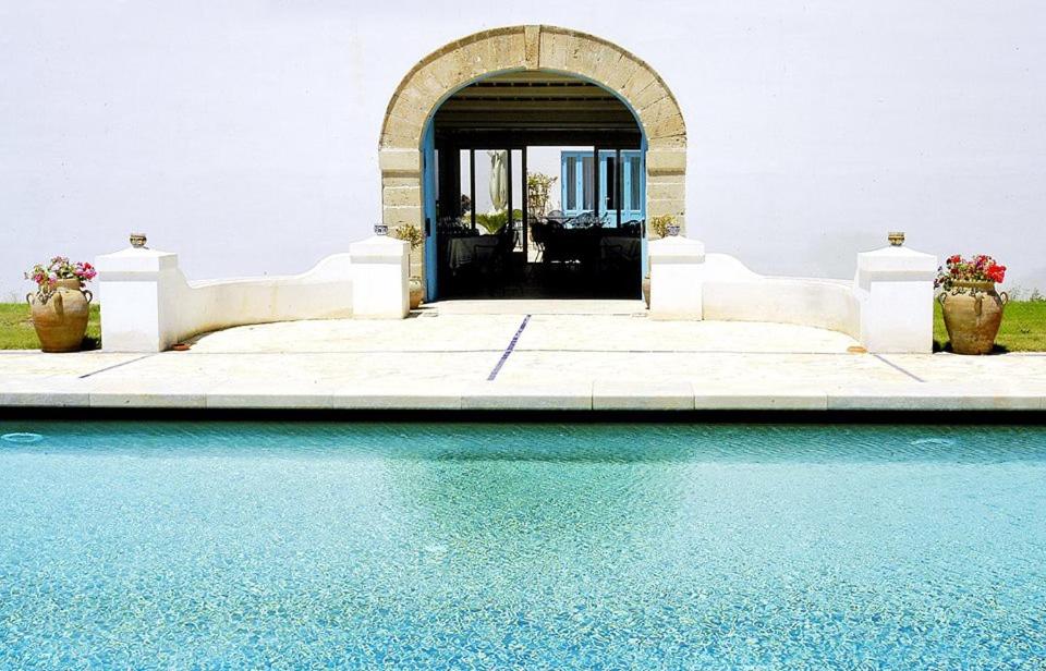 The swimming pool at or close to Relais Antiche Saline