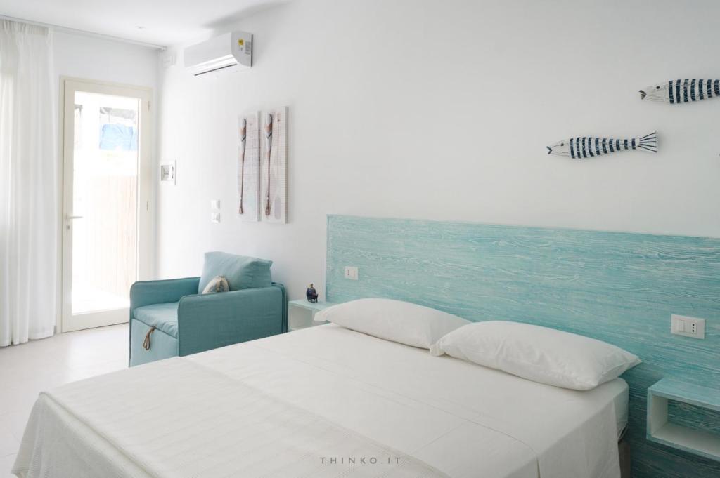 Postel nebo postele na pokoji v ubytování Hotel Universo