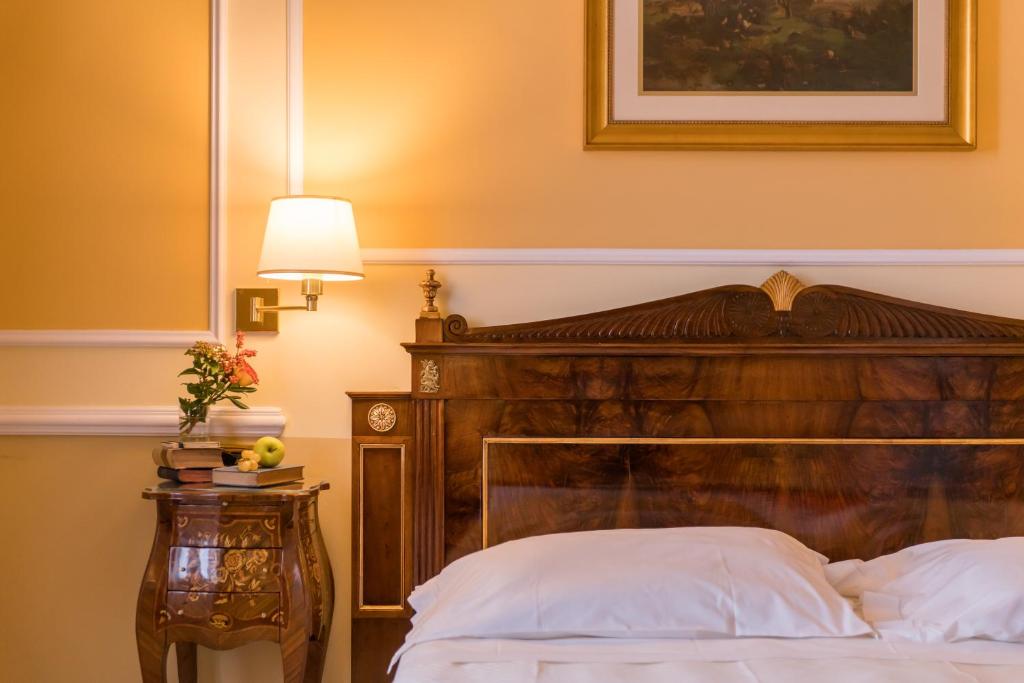 Voodi või voodid majutusasutuse Hotel Bristol Palace toas