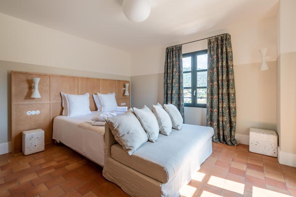Postel nebo postele na pokoji v ubytování Hôtel Restaurant Villa Joséphine