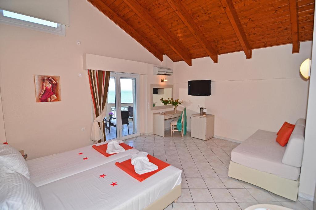 Postel nebo postele na pokoji v ubytování Al Mare Hotel