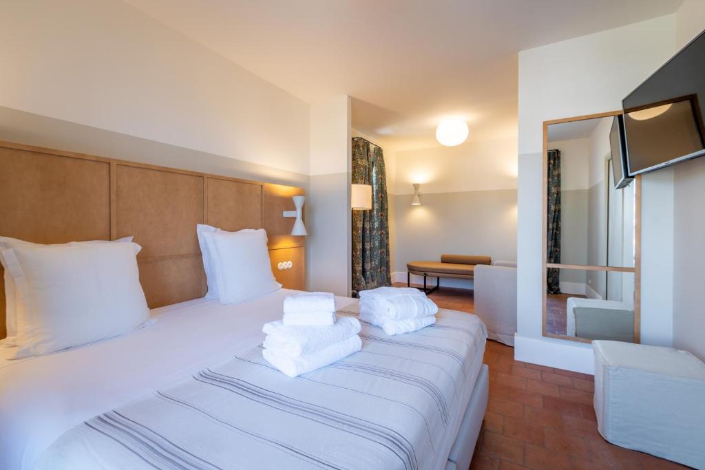 Postel nebo postele na pokoji v ubytování Hôtel Restaurant Villa Joséphine