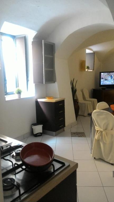 Televízia a/alebo spoločenská miestnosť v ubytovaní Casa Vacanze Gaia