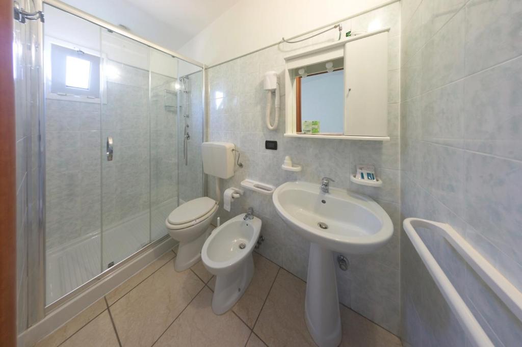 Koupelna v ubytování Hotel Universo