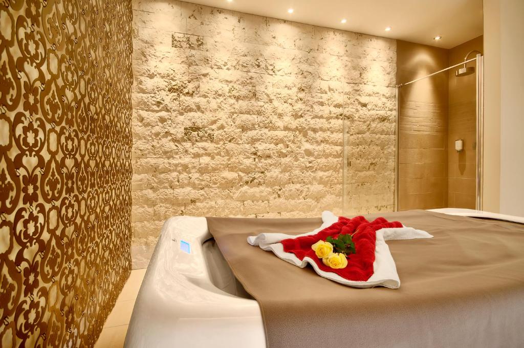 Postel nebo postele na pokoji v ubytování Sackmann Genuss und Spa Resort