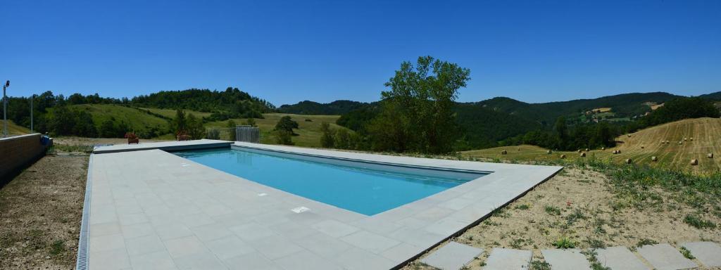 Bazén v ubytování Agriturismo Le Case nebo v jeho okolí