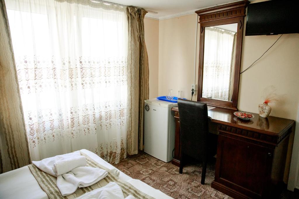 Postel nebo postele na pokoji v ubytování Giandra Resort