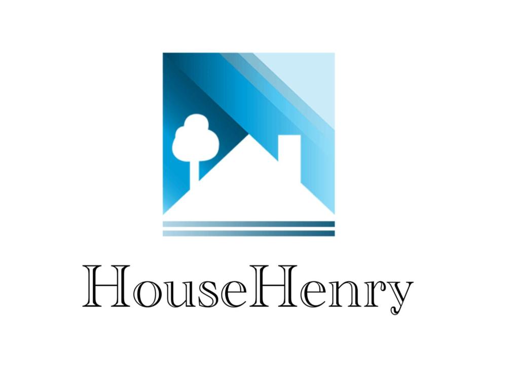 瓦多利古雷的住宿－House Henry，带有树的房子的标志和诚实的言词