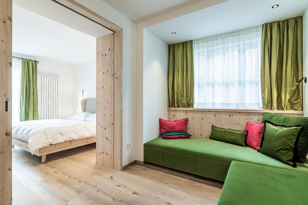 Postel nebo postele na pokoji v ubytování Hotel Drumlerhof