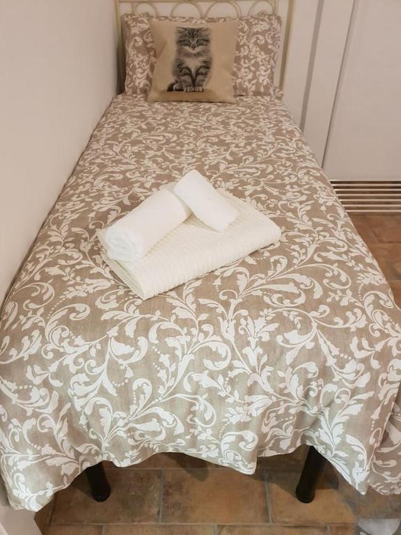 Postel nebo postele na pokoji v ubytování Suite le Scuderie a "le Moline" vita in fattoria
