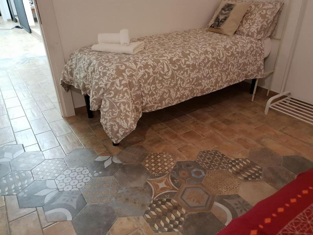 Postel nebo postele na pokoji v ubytování Suite le Scuderie a "le Moline" vita in fattoria