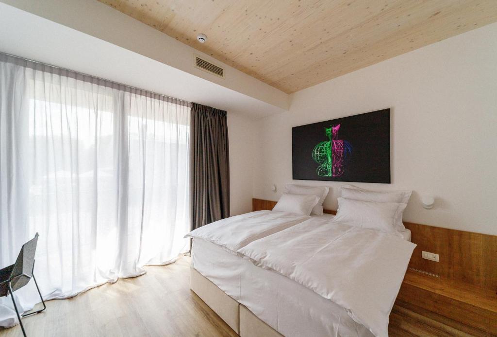 Postel nebo postele na pokoji v ubytování WUD hotel