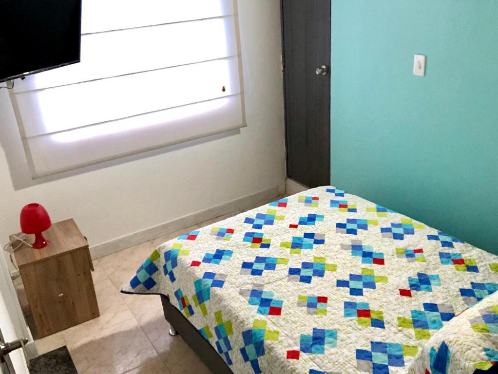 Postel nebo postele na pokoji v ubytování Aloha Hostel