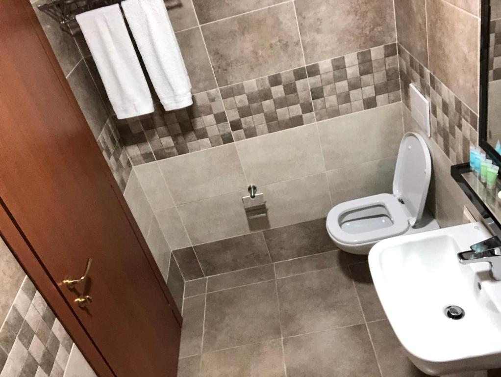 Koupelna v ubytování M-Rooms