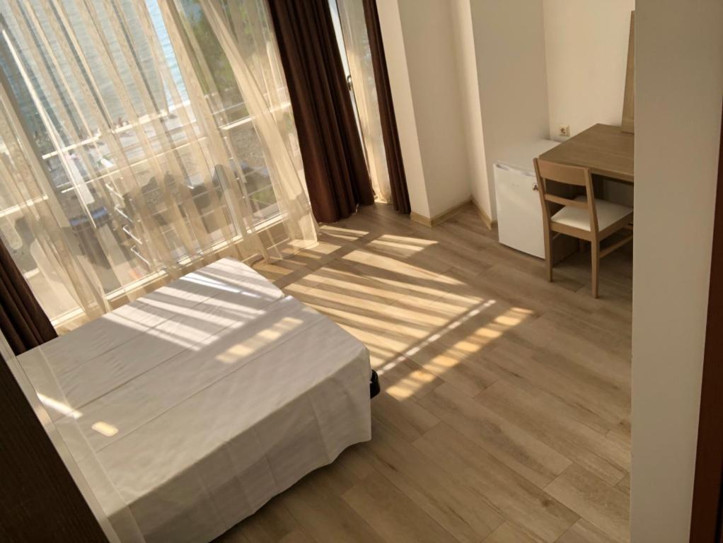 Postel nebo postele na pokoji v ubytování M-Rooms