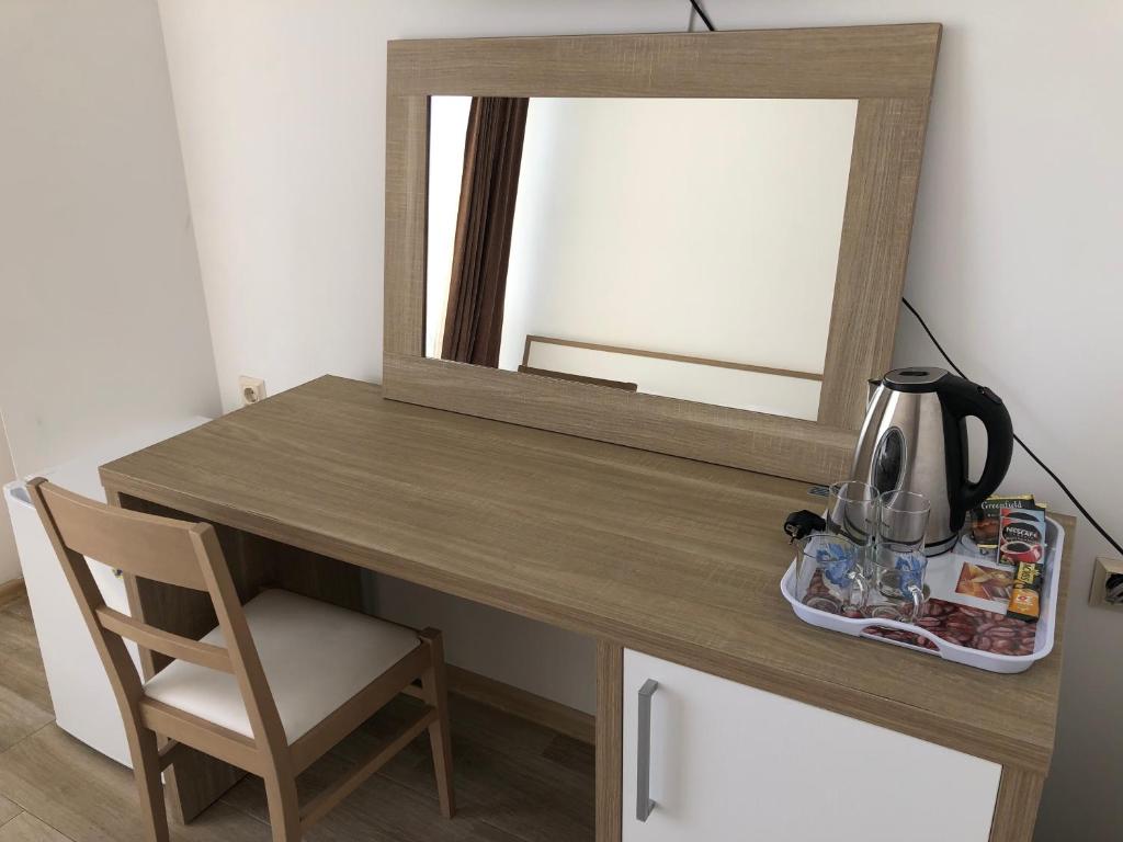 Kuchyň nebo kuchyňský kout v ubytování M-Rooms