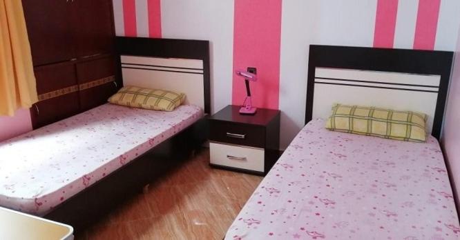 Postel nebo postele na pokoji v ubytování martil miramar